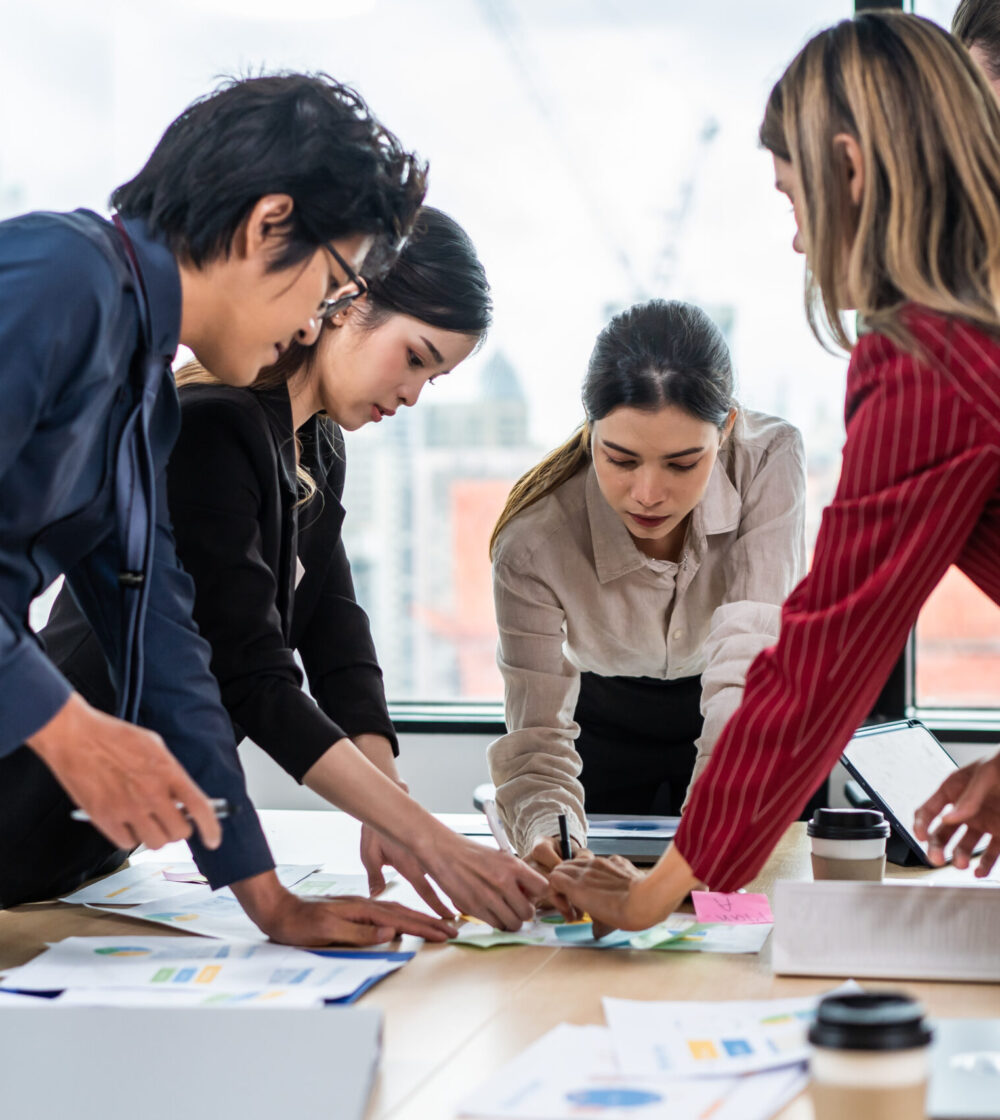 group-of-multi-ethnic-businessman-and-businesswoma-2025-03-24-23-56-44-utc Group of multi-Ethnic businessman and businesswoman working in office. Attractive employee brainstorm and meeting as team, plan and discuss project in workplace. Corporate of modern colleagues concept